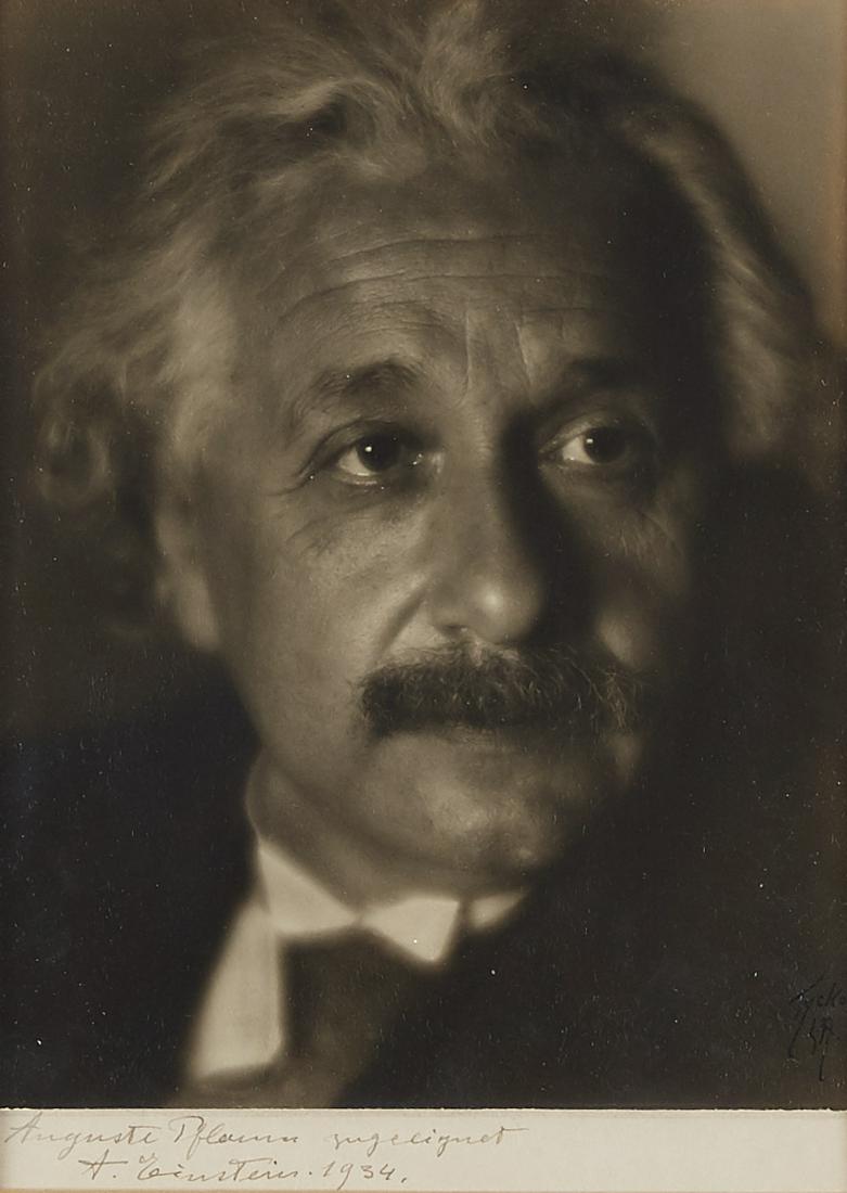 Tycko Albert Einstein 1934 Autograph Photograph: Autographed photograph of Albert Einstein, 1934. Photographed by Aaron Tycko, whose mark appears along the lower right. Silver gelatin print on textured linen paper. Inscribed by Einstein in pen along
