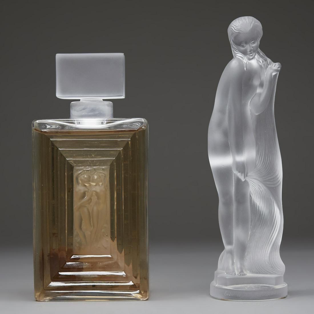 2pc Crystal Lalique Perfume Bottle Duncan Flacon and: Group of two frosted crystal pieces. One Lalique perfume bottle, marked along the underside. One Sevres nude figurine, marked Sevres, France along the underside and signed and numbered 1499/2000 along
