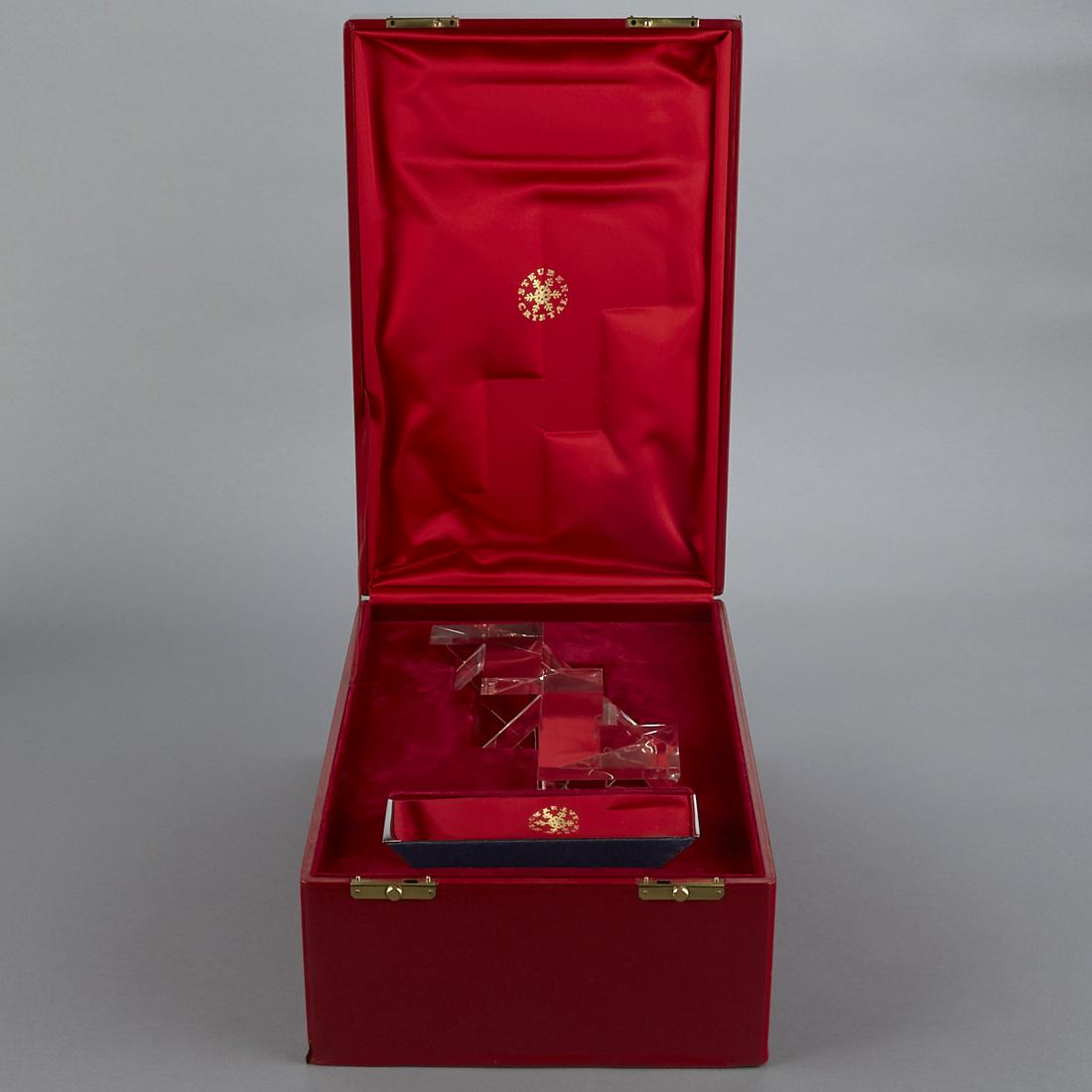 Steuben Cubist Modernist Sculpture w/ Box & Stand: Steuben, USA. Cubist and Modernist glass sculpture with a beautiful red box and stand. Marked "Steuben" along the underside. Sculpture; height: 10 3/4 in x width: 7 1/2 in x depth: 3 3/4 in.
