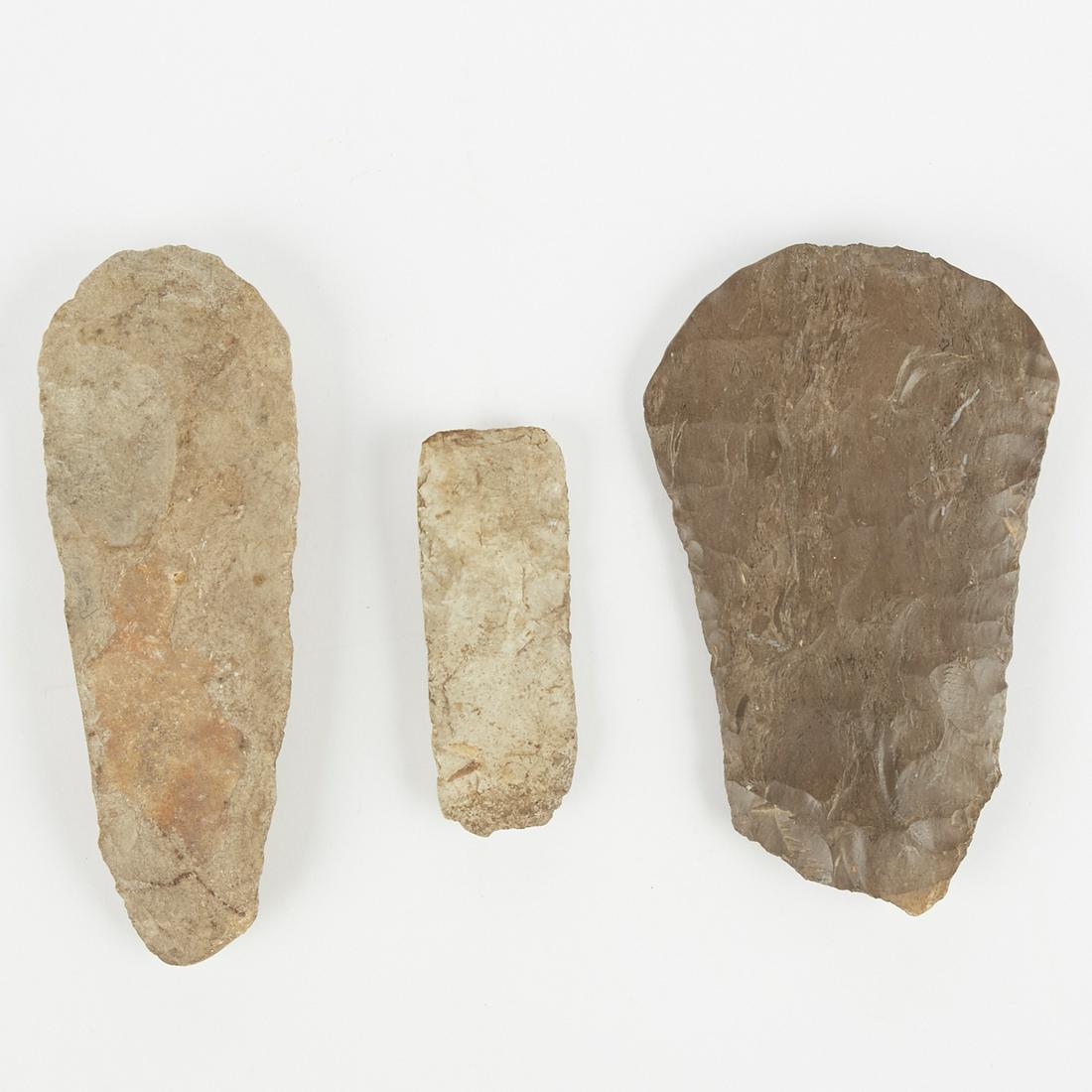 Grp: 3 Stone Tools Midwestern Chert Hoes: Group of three North American stone tools. Includes two midwestern hoes, one likely Mill Creek chert, and one likely Dover chert. Both hoes show polish from use.Keywords: Prehistoric, Pre-ColumbianLen