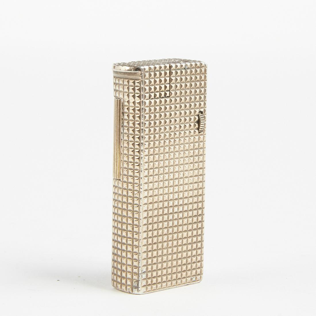 Dunhill Vermeil Broadboy Lighter Dated: Dunhill, United Kingdom. One mid-century Vermeil Broadboy Lighter. Impressed logo Dunhill along the underside. Patent # 101-74.