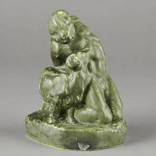 Cowan Pottery Isaac w/ Ram Sculpture - Rare: The Cowan Pottery Studio, Ohio, USA. Early 20th century biblical figural sculpture of Abraham's son, Isaac, bound to a rock with ram by his side rendered in a matte green glaze. Impressed mark along t