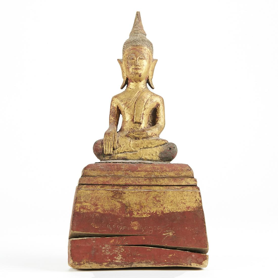 19th c. Burmese Thai Shan Carved Buddha: A lovely 19th century carved wooden Buddha with warm red gilding. From the southern states of Eastern Burma, used for ancestor worship. Height: 13 1/2 in x width: 7 in x depth: 3 1/2 in.