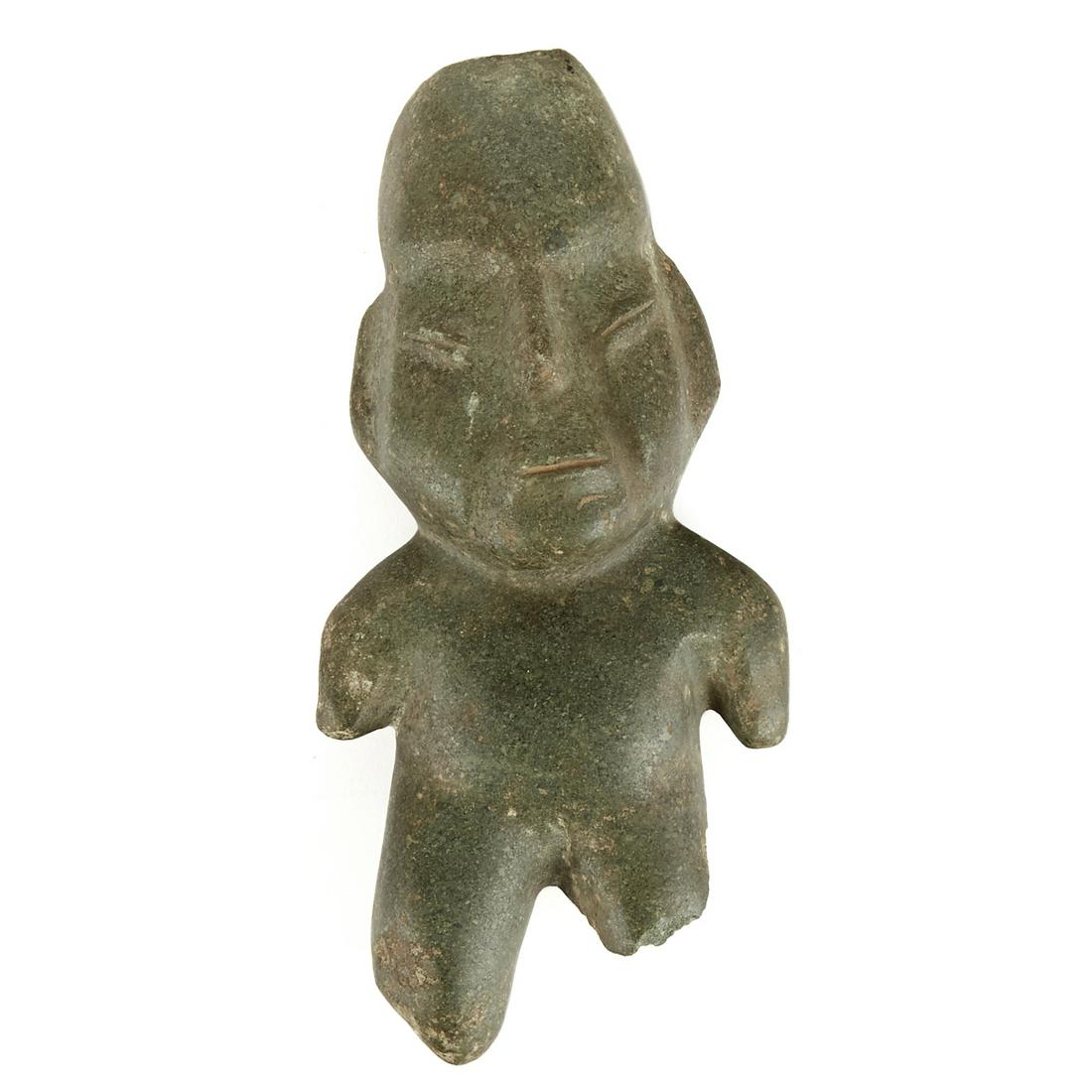 South or Central American Stone Figure: Stone human figure with delicately carved features, likely South or Central American. Possibly jade. Keywords: Prehistoric, Pre-Columbian. Height: 11 in x width: 5 1/2 in x depth: 2 in.