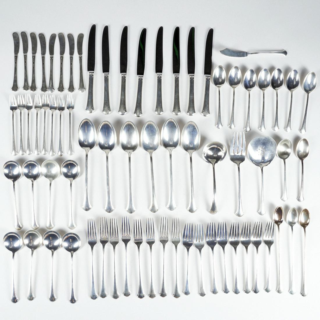 Set of Towle Chippendale Sterling Silver Flatware: Set of Towle Chippendale sterling silver flatware with carrying case and two Towle Sterling pamphlets. Each dinner knife is marked along the underside with "TOWLE STAINLESS." Each piece, exc