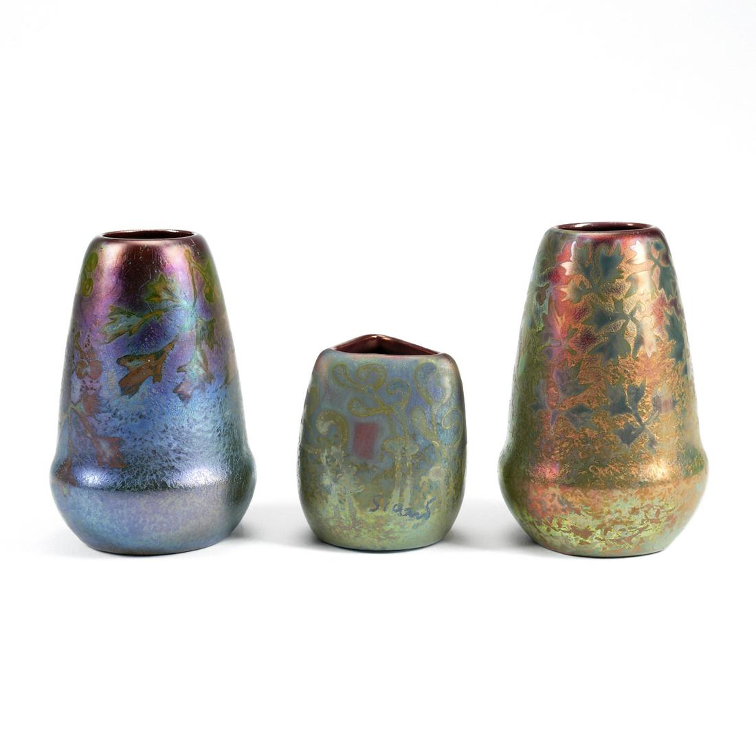 Grp: 3 Weller Sicardo Iridescent Pottery Vases: Jacques Sicard (1863-1925) for Weller Pottery, Fultonham, Ohio, USA. Group of three studio pottery vases decorated in Sicard's signature iridescent glaze and floral motifs. This design was known as th