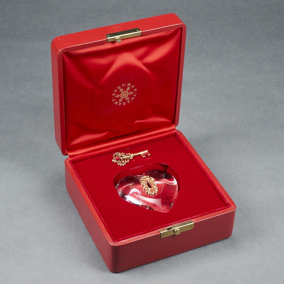 Steuben Crystal 18K Heart w/ Key Paperweight: James Houston (American, 1921-2005) for Steuben, United States. Crystal heart paperweight with 18K gold key and escutcheon, ca. 1970s. Incised mark "Steuben" along the underside of the paper