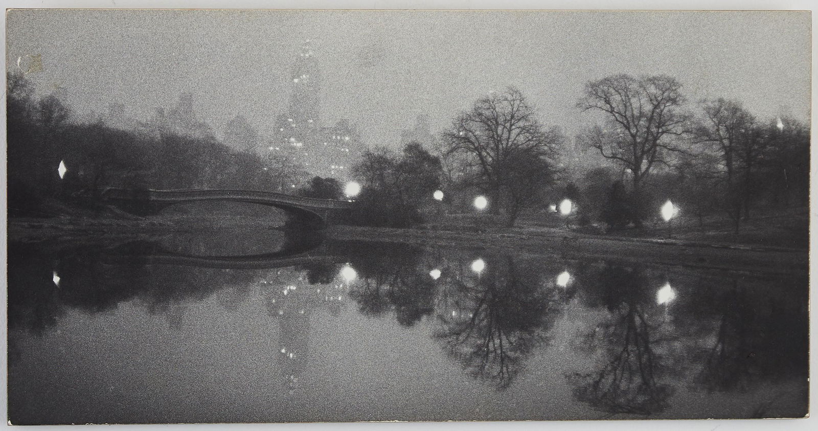 Esther Bubley "Bow Bridge Central Park" Photograph: Esther Bubley (American, 1921-1998). Photograph of the Bow Bridge in Central Park, New York, at night. Silver gelatin print. Stamped along the verso: "Esther Bubley, 1741 Broadway, New York 19, N