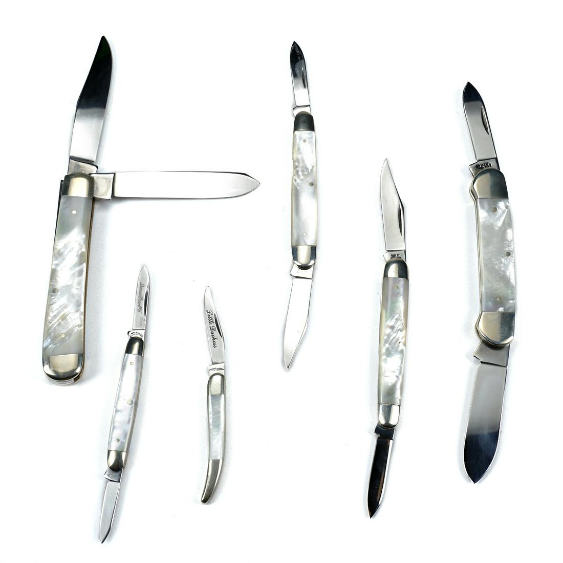 Grp: 6 Custom Mother of Pearl Folding Knives - Case: Group of six custom folding knives with mother of pearl handles from a variety of makers. Includes three Case knives, one Queen Cut knife, one Little Duchess knife, and one C. Schlieper knife. Height 