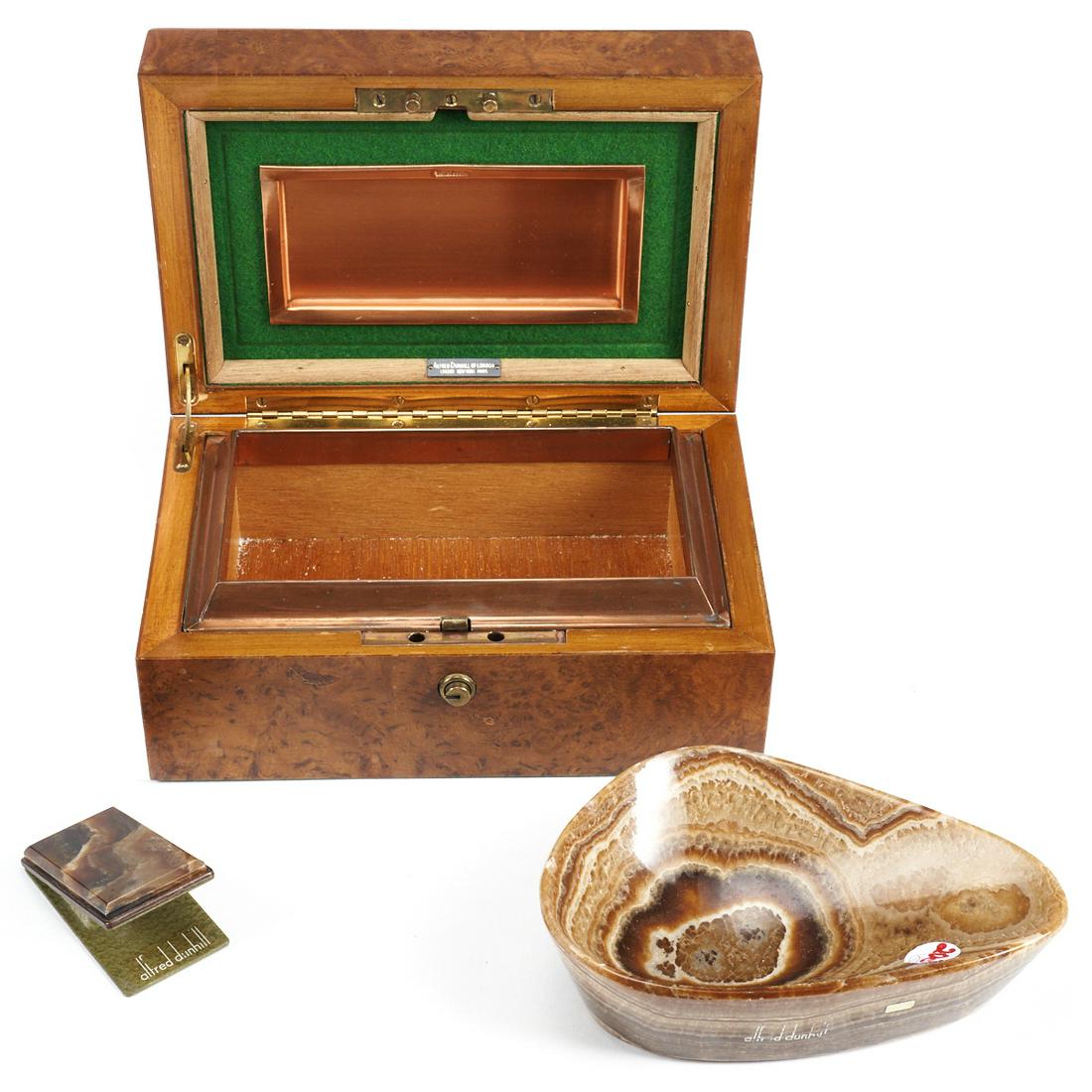 Grp: 3 Alfred Dunhill Luxury Goods - Clip Bowl Humidor: Alfred Dunhill, London. Group of three luxury items, including one clip marked "Alfred Dunhill" along the interior of the clip and "Germany" along the reverse; one bowl marked &quo
