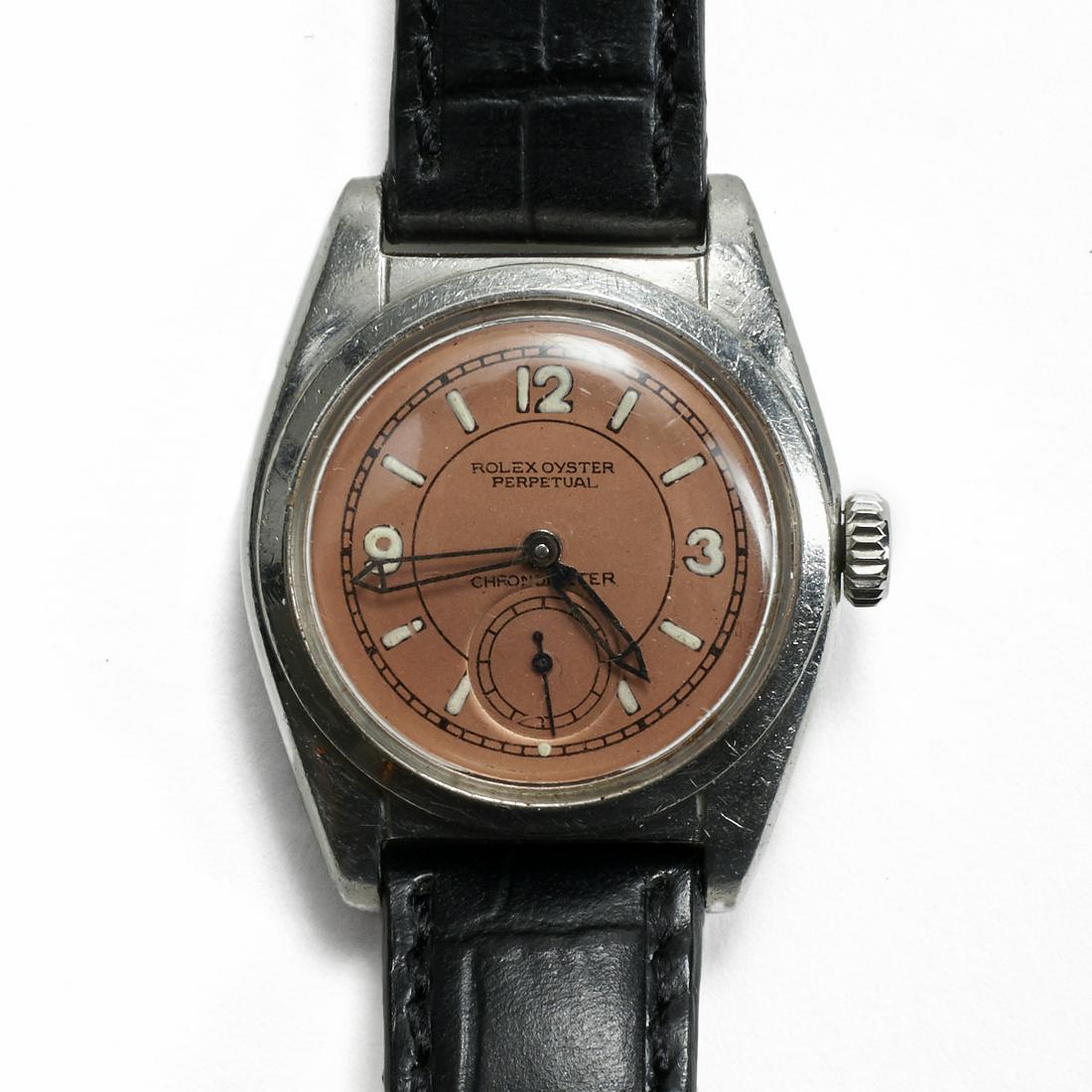 Rolex - Oyster Perpetual - Chronometer - 6050 - 687759: Vintage Rolex Oyster Perpetual Chronometer watch. Copper dial with one subsidiary dial and luminescent numbers. Stainless steel case. Black leather strap with Rolex buckle. Reference number: 6050. Ser