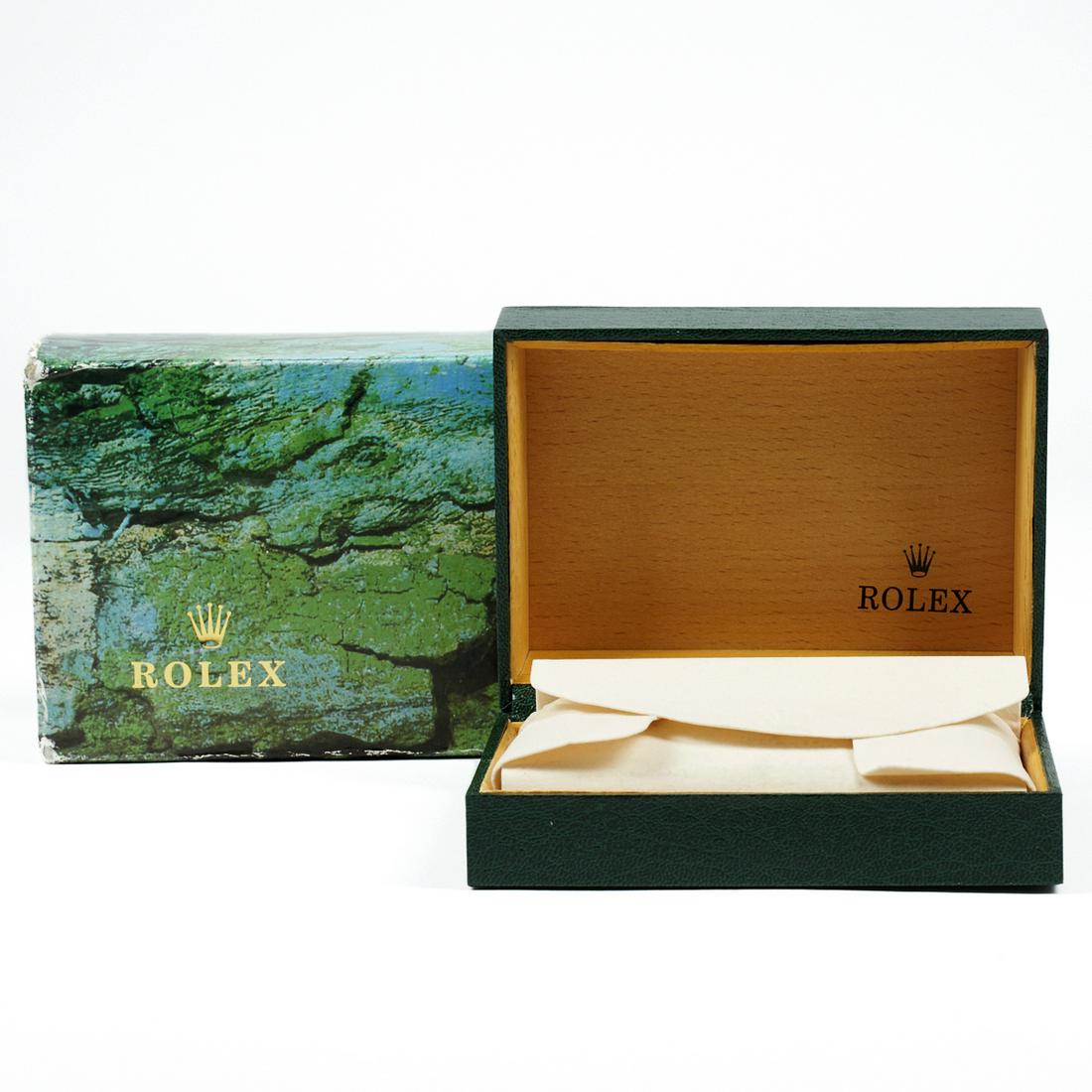 Vintage Rolex Inner and Outer Box: Vintage Rolex green inner and outer box with cushion.Inner Box; height: 2 1/4 in x width: 5 7/8 in x depth: 4 1/4 in. Outer Box; height: 2 1/2 in x width: 6 1/8 in x depth: 4 1/2 in