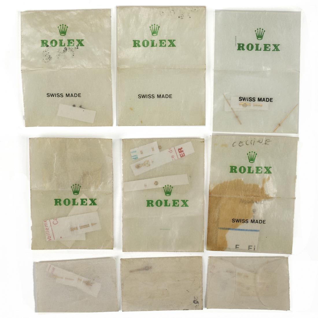 Grp: Watch Hands: Group of watch hands in Rolex bags.