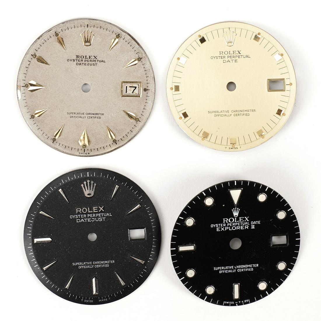 Grp: 4 Rolex Watch Face Dials - Datejust: Group of four Rolex Oyster Perpetual watch dials. Two Oyster Perpetual Datejust dials, one tan and one black; one Oyster Perpetual dial; and one Oyster Perpetual Date Explorer II dial.