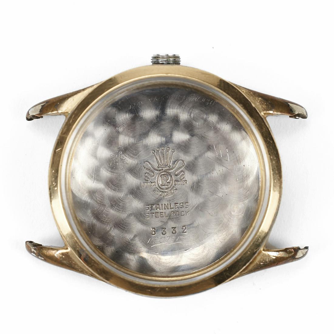 Watch Case Crystal & Stainless Steel Back - Engraved: Watch case face crystal and stainless steel back marked "Geneva. Swiss. R. Rolex. Stainless Steel Back. 6332." Engraved along the reverse of the backing: "Don. Love. Carolyln. Dec 25, 5