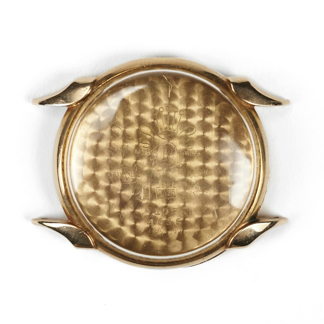 9K Gold Watch Case Crystal & Back - Engraved: Watch case crystal and backing, marked "Geneva Swiss. R. Rolex. 9K 0.375. 195. 4636." Engraved along the reverse of the backing: "Roan Antelope Copper Mines Limited. Presented to K. A.