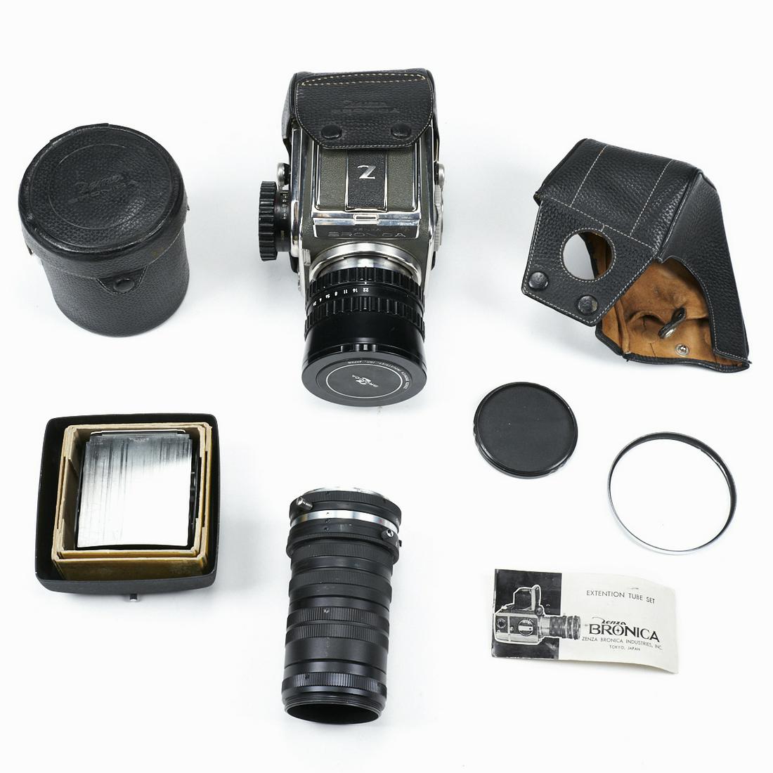 Zenza Bronica Camera Body & Accessories: Zenza Bronica camera body with Nikon Nikkor-O 50mm 1:2.8 lens, No. 33376. Includes a number of other Zenza Bronica accessories. Lovely medium format camera with many accessories. Sold as is, untested.