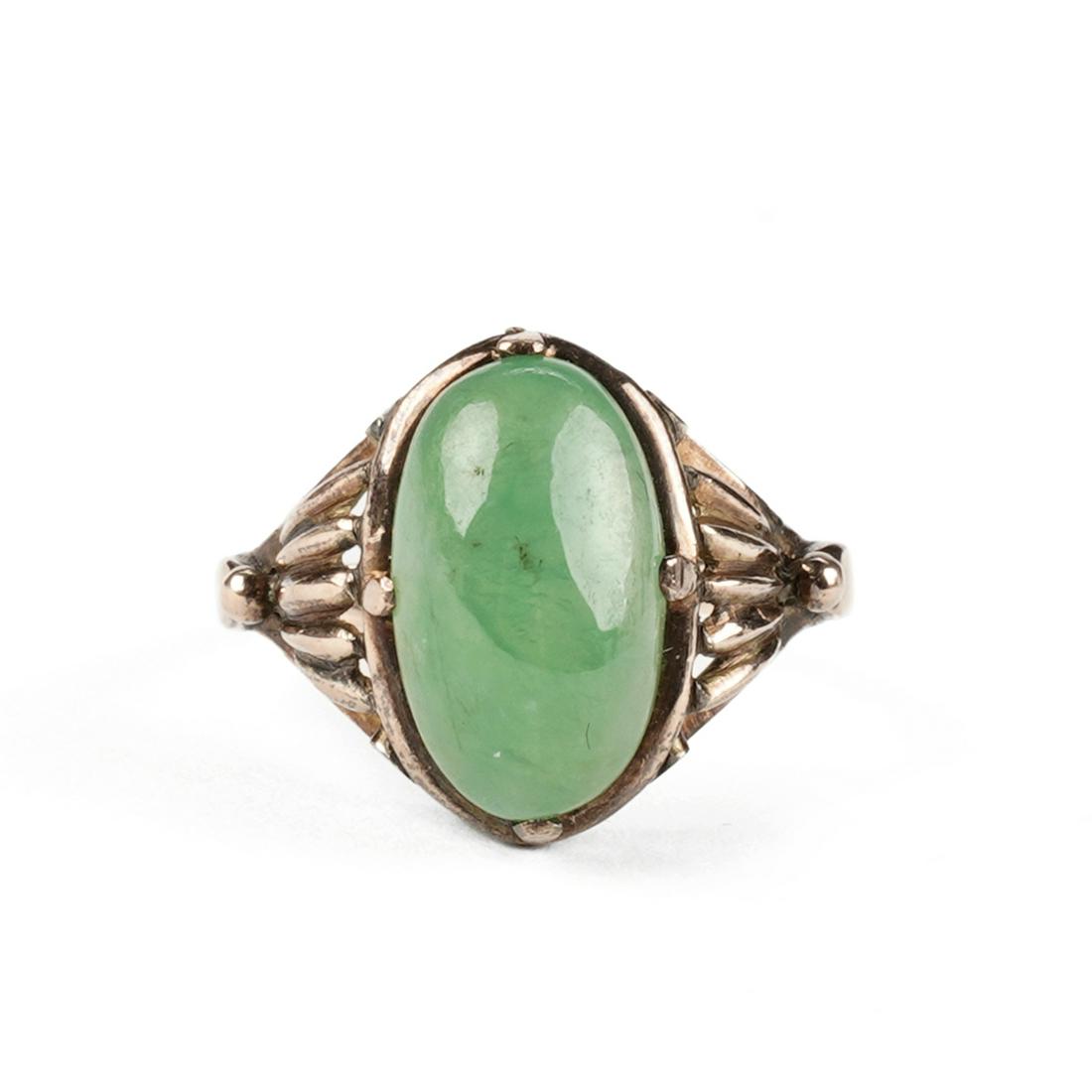 18K Gold Chinese Jade Ring - Jadeite Type A: 18K yellow gold and jade Art Nouveau style ring. This ring centers a Type A jadeite jade cabochon with a slightly bluish green hue, moderated tone, and moderate saturation. Impressed hallmark "18