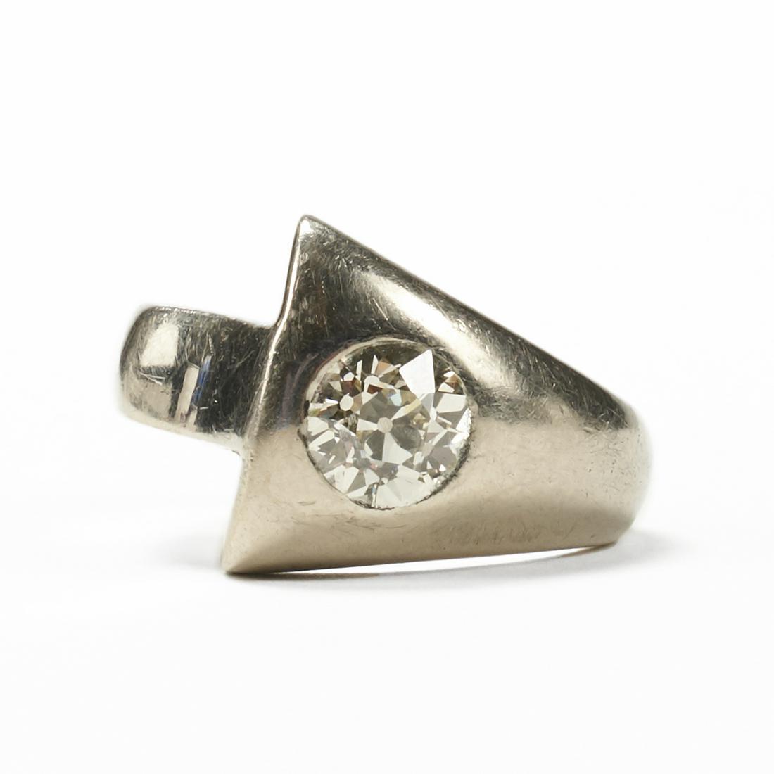 14K White Gold 1.2 Ct Diamond Ring: Vintage 14K white gold old European cut diamond solitaire ring with a tapered V-shape top. Thre ring centers an old European cut diamond of L-M color, VS2 clarity, measuring 6.50 mm by 4.39 mm, weighi