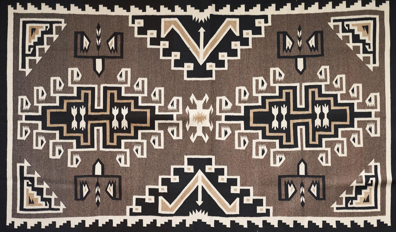 Small Two Grey Hills Navajo Rug 4' x 8': Small Native American Navajo rug or blanket in the Two Grey Hills pattern. Woven from black, brown and white wools. The dense, complex, and beautifully executed geometric designs are characteristic of