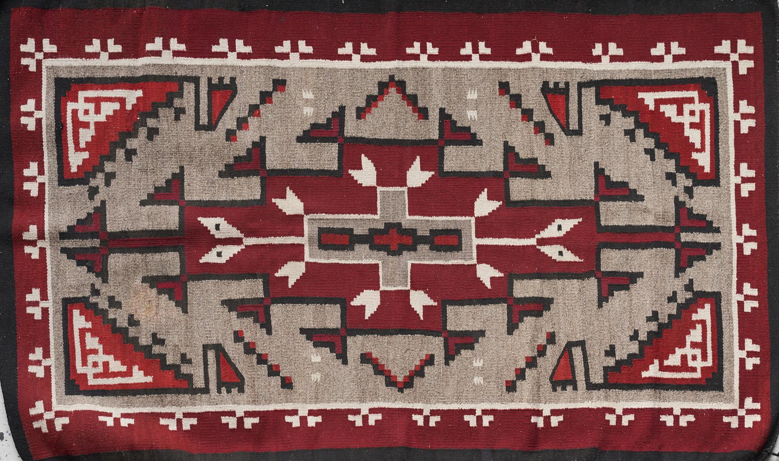 20th C. Navajo Storm Pattern Rug: Native American Navajo Storm Pattern rug or blanket, ca. 20th century. Beautifully hand woven from black, red, white and gray wools. Height: 2 ft 10 1/2 in x width: 4 ft 9 in.