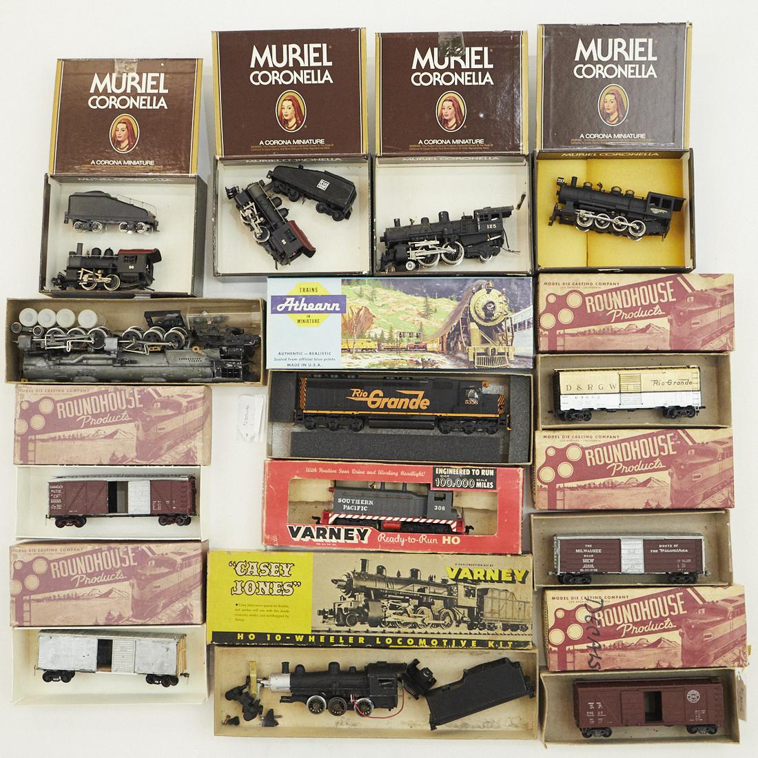 Grp: 13 Model Trains & Tender - Roundhouse - Varney: Group of thirteen model trains and tender from brands including Varney, Athearn, Bowser, Rivarossi, New One Model, and Roundhouse. Most of the trains in their original box.