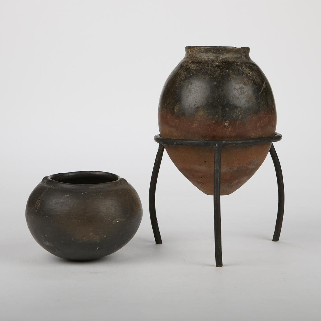 Grp: 2 Southwestern Ollitas Pots: Group of two antique Southwestern cooking pots, or ollitas, including one pot in a black glaze, with a label that reads "Ollita negra bonita" affixed along the side; and one pot with black glaze along