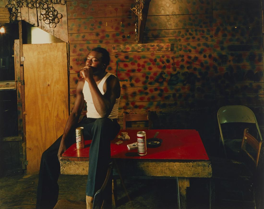 Birney Imes Photograph Man on Red Table (1 of 2)