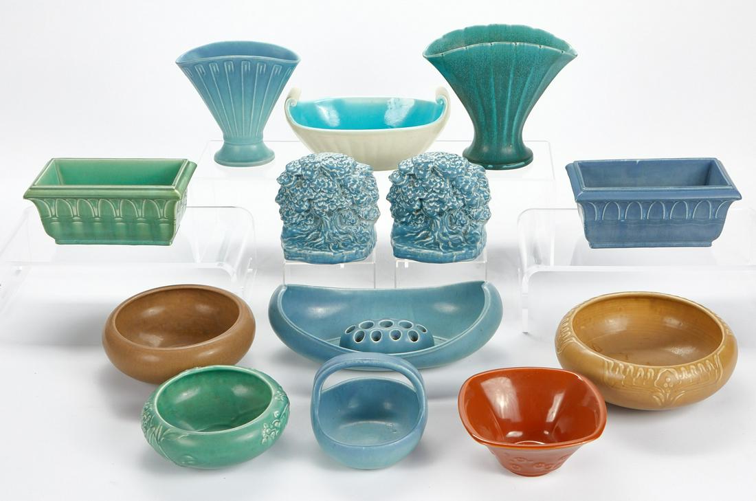 Grp: 13 1920s Rookwood Pottery Planters & Bowls: Rookwood Pottery, Ohio, USA. Group of eight Arts & Crafts pottery pieces dating from 1921 to 1929.Includes one blue basket bowl impressed with the Rookwood mark, shape number 1641, and dated "XXI
