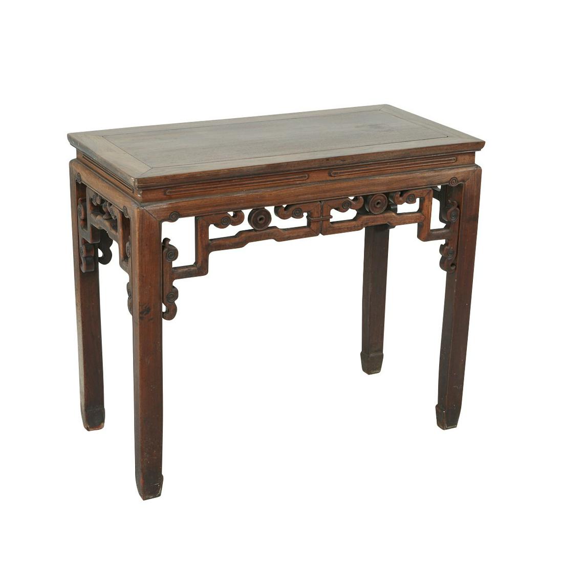 Chinese Hardwood Altar Table: Chinese late Qing hardwood altar table. With a key-fret pierced skirt surmounted by a rectangular top and square legs terminating in hoof-shaped feet. Height: 33 in x width: 38 1/2 in x depth: 19 in.