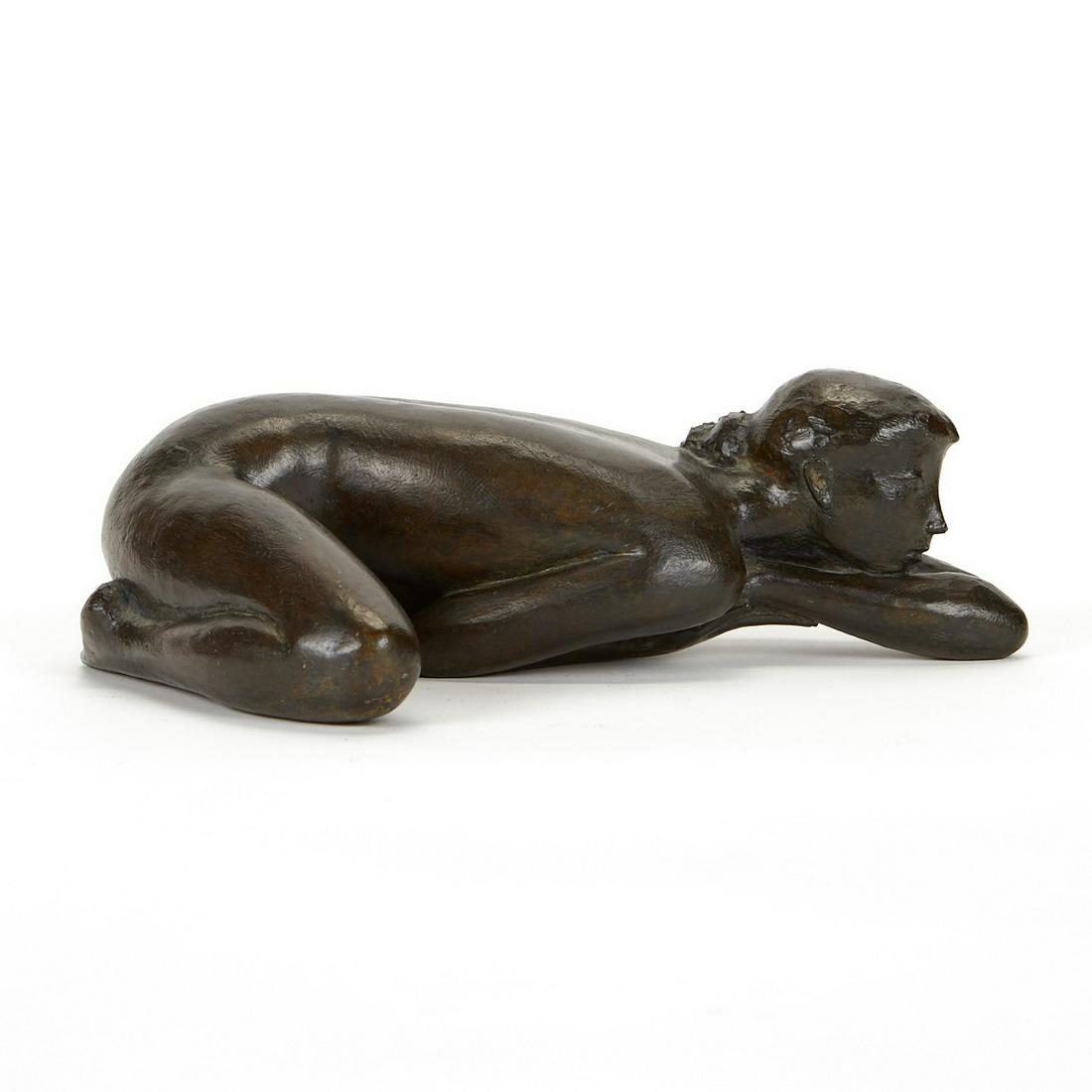 Jacques Coquillay Bronze Sculpture Prone Nude: Jacques Coquillay (French, b. 1935). Bronze sculpture depicting a prone nude woman. The womanâ€™s knee and one arm are bent, her face rests on her inside elbow, and the other arm is under her bod