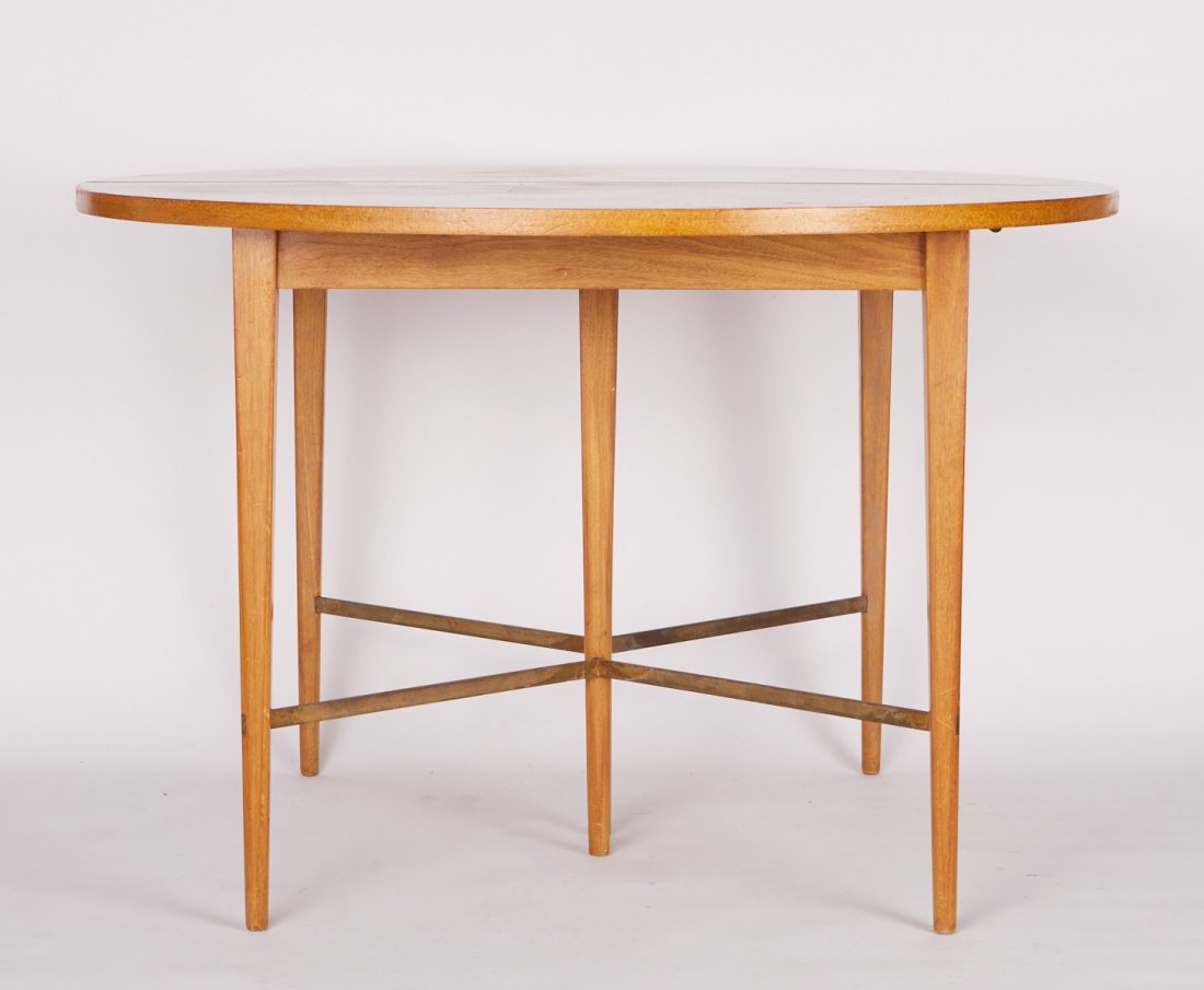 Walter Wabash Paul McCobb Style Table: Walter Wabash, United States. Mid-century modern round dining table, which bears a resemblance to several of Paul McCobb's designs. Inkstamped "Walter Wabash, Grand Rapids, Michigan" along the undersi