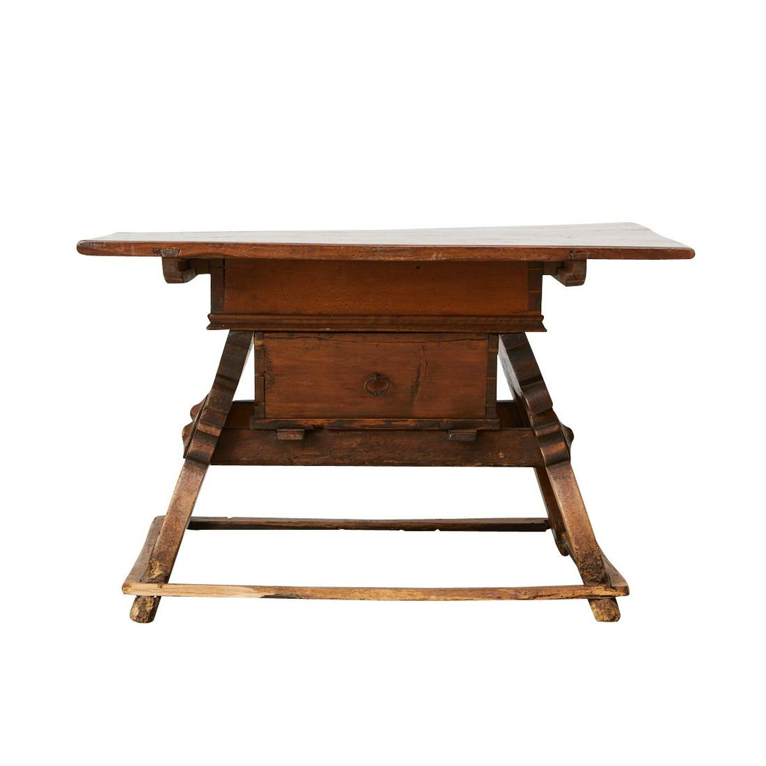 18th c. Swiss Farmhouse Table: 18th century Swiss farmhouse table. With a square top resting on slanted legs. A small drawer for storage and carved skirt below the tabletop. Provenance: From the Estate of Horst Rechelbacher, Osceol