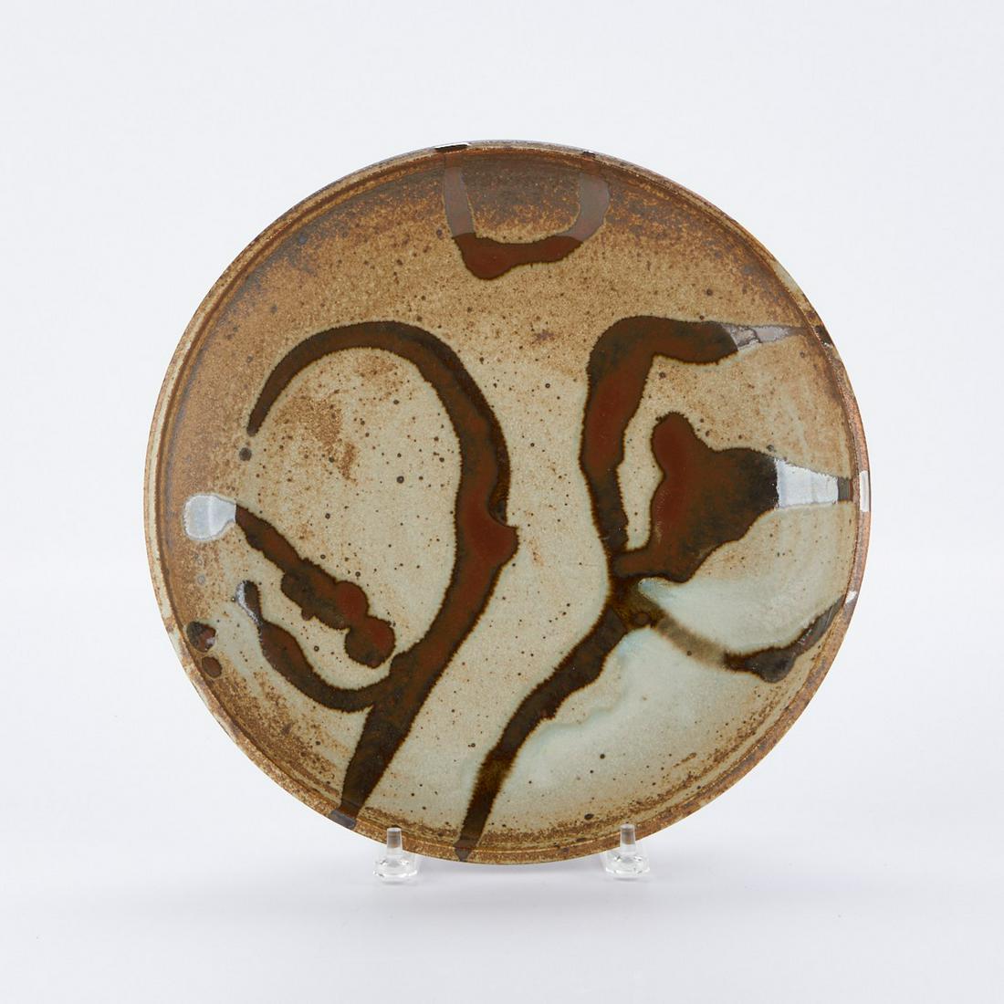 Warren MacKenzie Splatter Decorated Charger: Warren MacKenzie (American, 1924-2018). Studio pottery ceramic charger. Glazed stoneware with painted splatter decoration along the bowl. Marked along the footrim.Warren MacKenzie was a renowned Minne