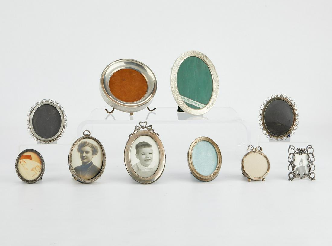 10 Sterling Silver Miniature Frames: Group of ten sterling silver miniature picture frames. Each marked along the sides.Round; diameter ranges from 2 1/2 in to 5 3/4 in. Square; height: 2 3/4 in x width: 2 1/4 in.