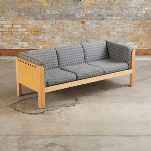 Metropolitan Furniture Company Maple Sofa: Metropolitan Furniture Company, San Francisco, CA, United States. One contemporary Postmodern wood frame three-cushion sofa, ca. 1990s. Upholstery, maple wood. Retains fabric label along the underside