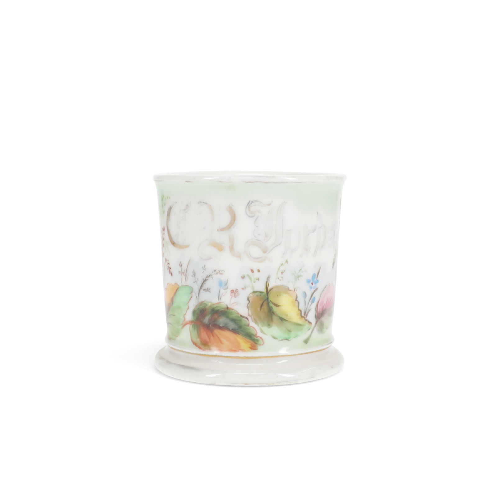 H&Co Limoges Vintage Antique Porcelain Shaving Mug: H&Co., Limoges, France. Vintage antique porcelain shaving mug depicting multi-colored leaves and flowers against a pale green background. The name C.R. Jordan written along the side. Marked H&Co. alon