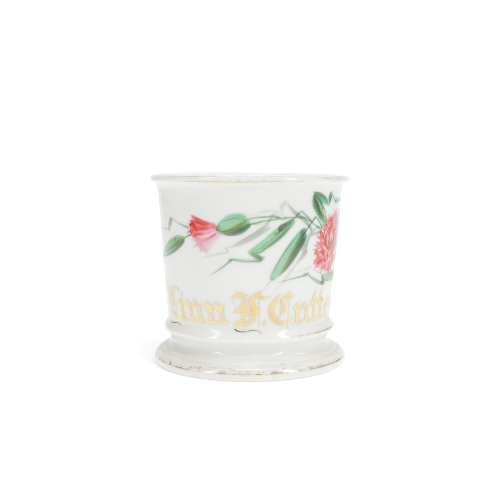 Vintage Antique Austrian Porcelain Shaving Mug: V&D, Austria. Vintage antique porcelain shaving mug depicting a blooming flower. With the name Linn F. Cutter in gold below the flower. Stamped "V&D Austria" in green along the underside. Th