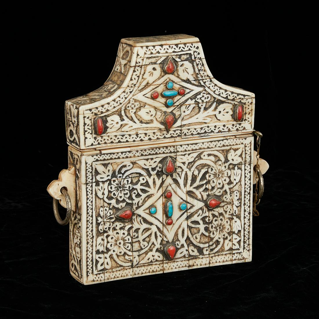 Islamic Qur'an Box - Bone, Turquoise, Carnelian: Islamic Qur'an box comprised of tiled bone with inset carnelian and turquoise stones, Moroccan. Profusely carved with floral and foliate designs. Script along one side reads "Wala ghaliba illa Al