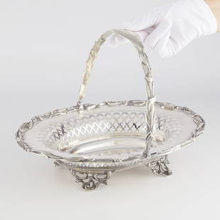 Ball, Tompkins & Black Coin Silver Basket: William Forbes (American, 1798-1888) for Ball, Tompkins, & Black, United States. Coin silver handled basket, ca. 1839-1851. The handle and rim with an intertwining repousse decoration depicting cattai