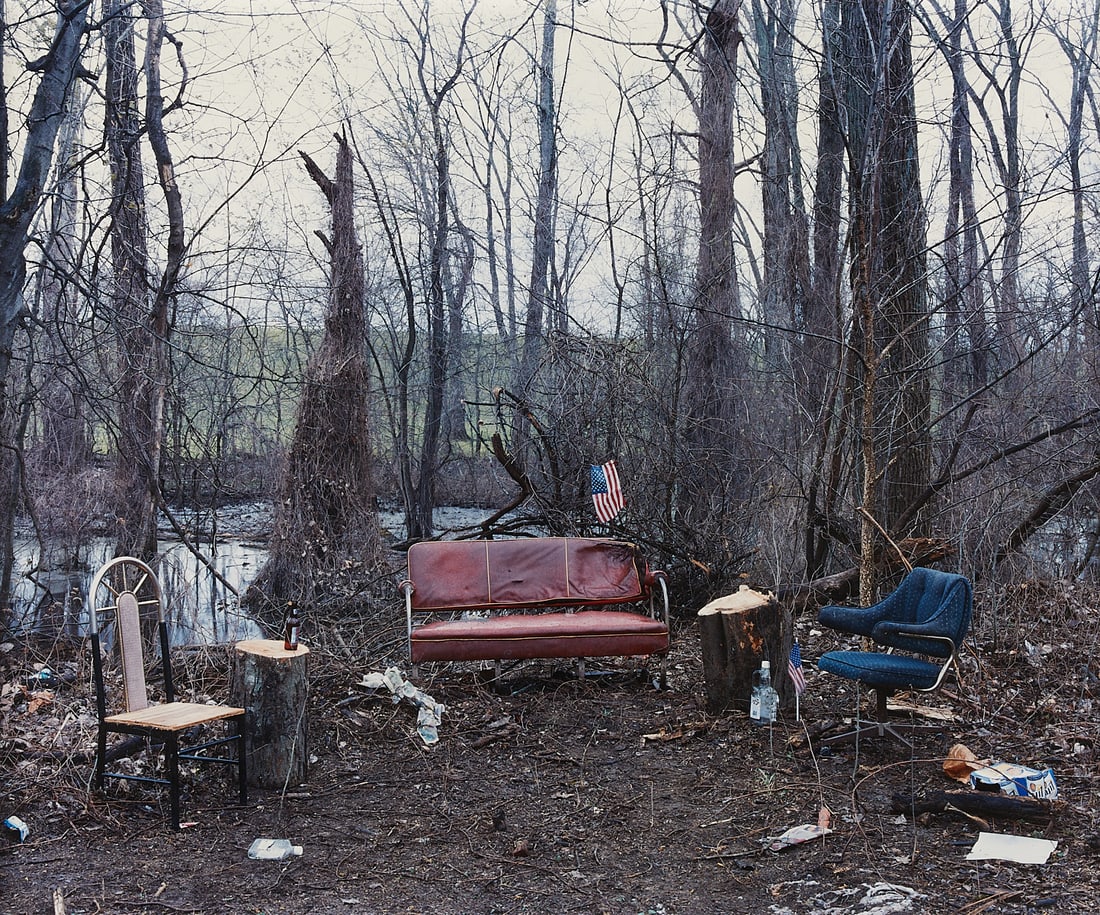 Alec Soth "Luxora, Arkansas" C-print 2005: Alec Soth (American, b. 1969). Chromogenic print photograph titled "Luxora, AR (Arkansas)" depicting chairs and a couch in a desolate forest. Signed, titled, dated, and numbered 4/10 along the verso.S