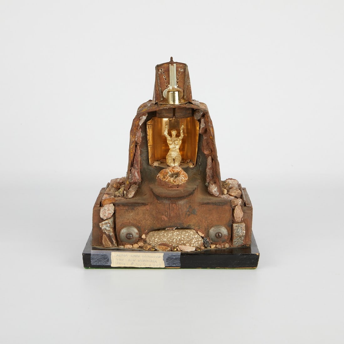 Ward Lockwood "Sun Worshipper" Sculpture: John Ward Lockwood (American, 1894-1963). Mixed media sculptural lamp titled "Sun Worshipper." Label with the title affixed along the base. The switch for the lamp is along the top of the la