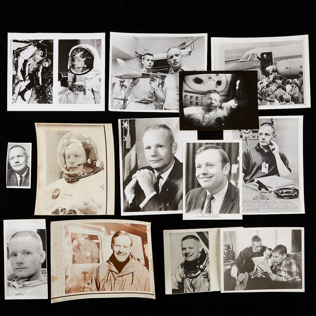 13 Neil Armstrong Photos from Star Tribune: Group of 13 gelatin silver prints and original vintage photographic reproductions related to Neil Armstrong from the archives of the Star Tribune including subjects related to: holding the camera he u