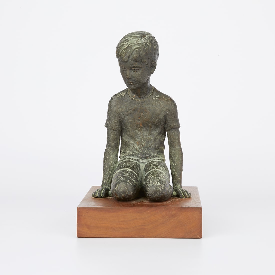 Miriam Shelton Bronze Statue of Kneeling Boy: Miriam Shelton (American, b. 1926). Bronze statue of a kneeling boy. Incised initials and "3-6" along the back of the figure. Incised signature, 3-6, and 66-67 along the underside of the wooden base. 