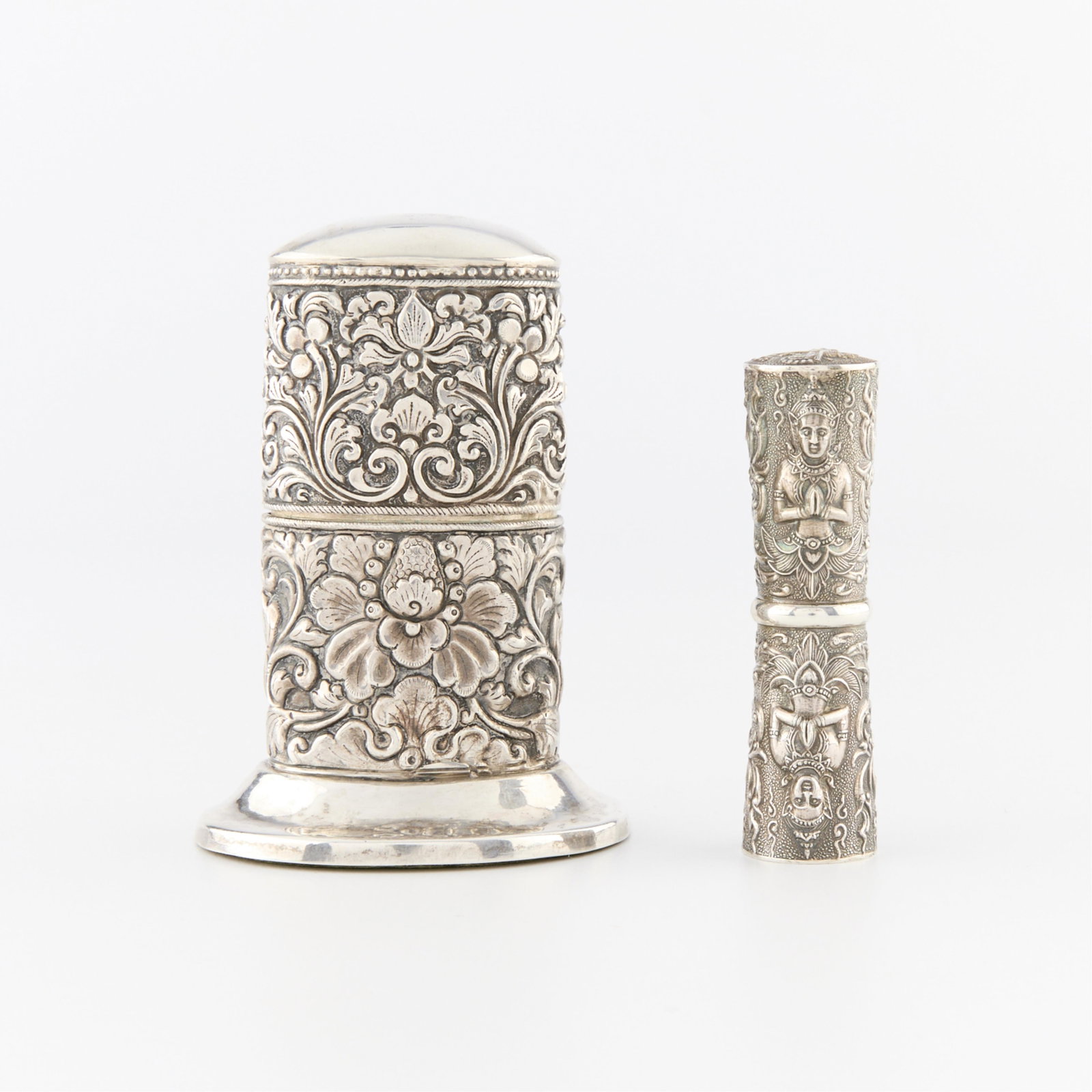 Sterling Case w/ Toothpicks & 800 Silver Cigar Lighter: Siam sterling case of repousse design featuring dieties. Marked at the base Siam Sterling. The top pulls off to open, inside two silver tooth picks, one marked sterling. 800 silver cigar lighter of re