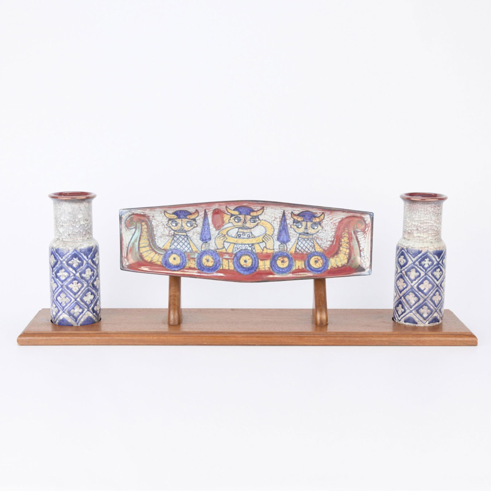 Set 3 Starck for Michael Andersen & Son Ceramics: Marianne Starck (German-Danish, 1938-2007) for Michael Andersen & Son, Denmark. Set of three ceramic vessels including one oblong plate or platter and a pair of vases with a teak wooden display tray o