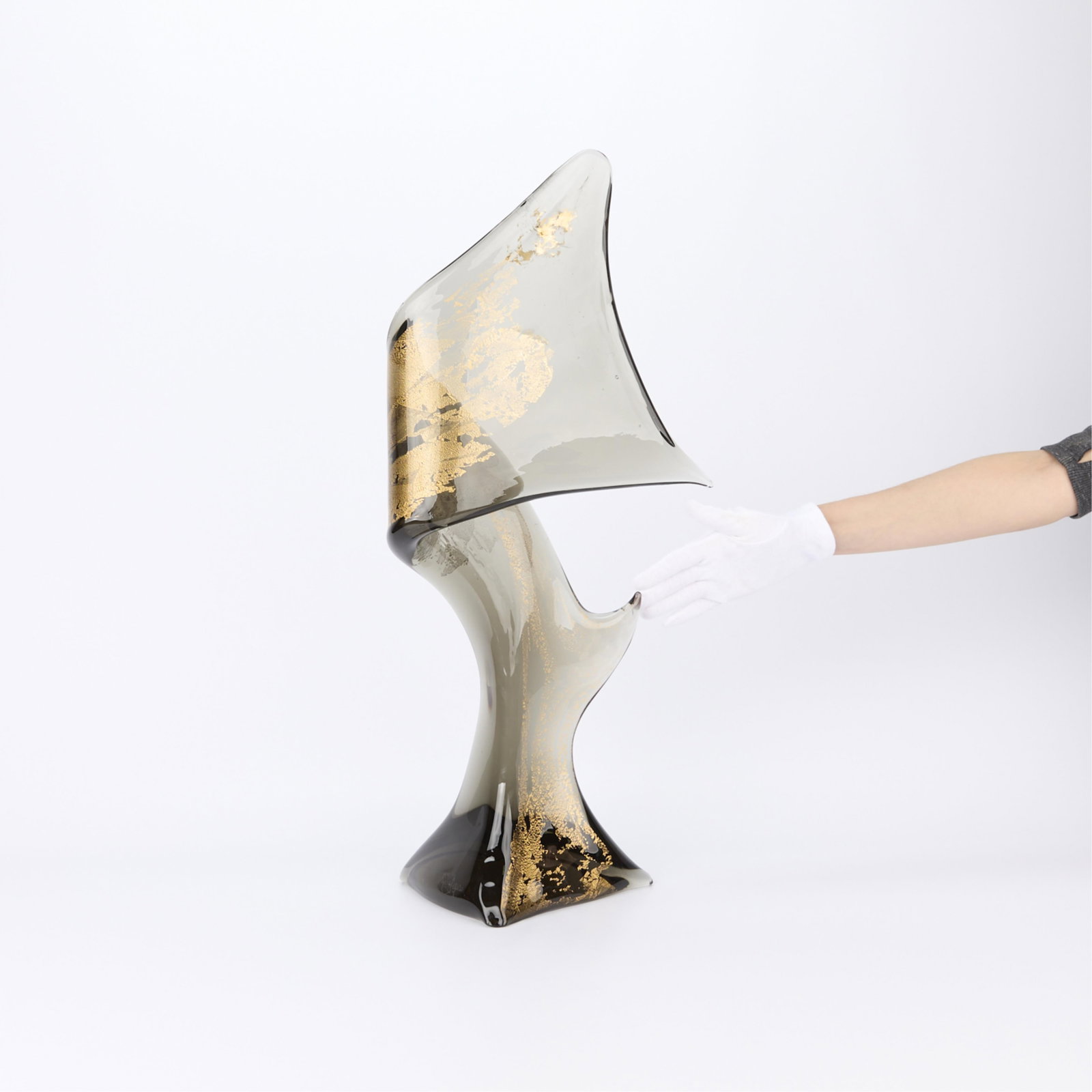Livio Seguso Abstract Murano Glass Sculpture: Livio Seguso (Italian, b. 1930). Abstract smoked Murano glass sculpture of amorphous form with gilt throughout, 20th century. Etched signature along the footrim. Height: 26 1/4 
