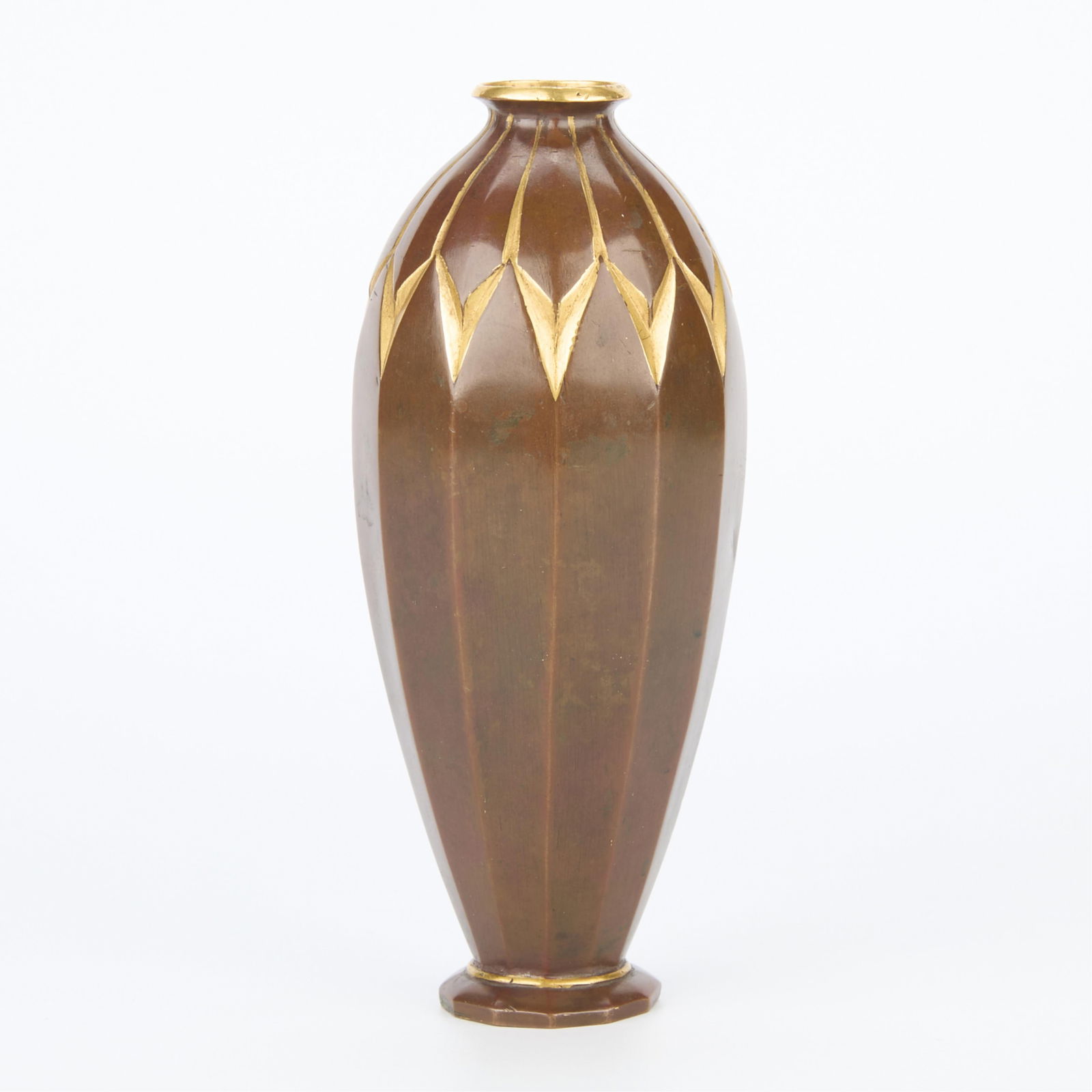 Small 20th c. Christofle Bronze Dinanderie Vase: Christofle, France. Small Art Deco patinated and gilt bronze dinanderie vase, early 20th century. With gilt accents along the rim and the contours of geometric facets along the upper third of the vess