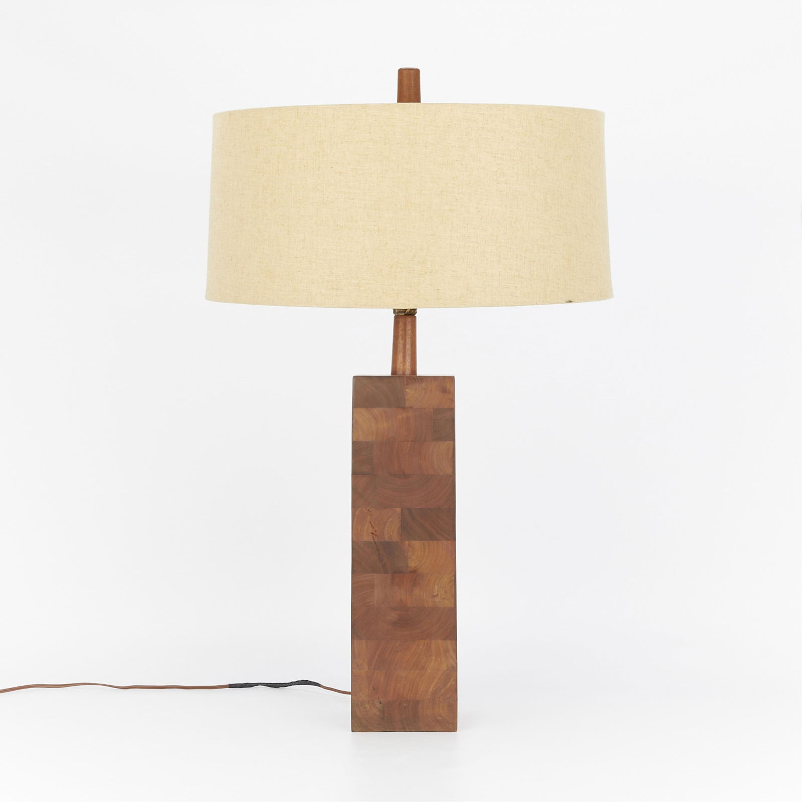 Martz for Marshall Studios Stacked Walnut Lamp: Gordon and Jane Martz for Marshall Studios. Mid-century modern stacked walnut table lamp with a linen shade.Height: 30 in x width: 20 in x depth: 20 in.