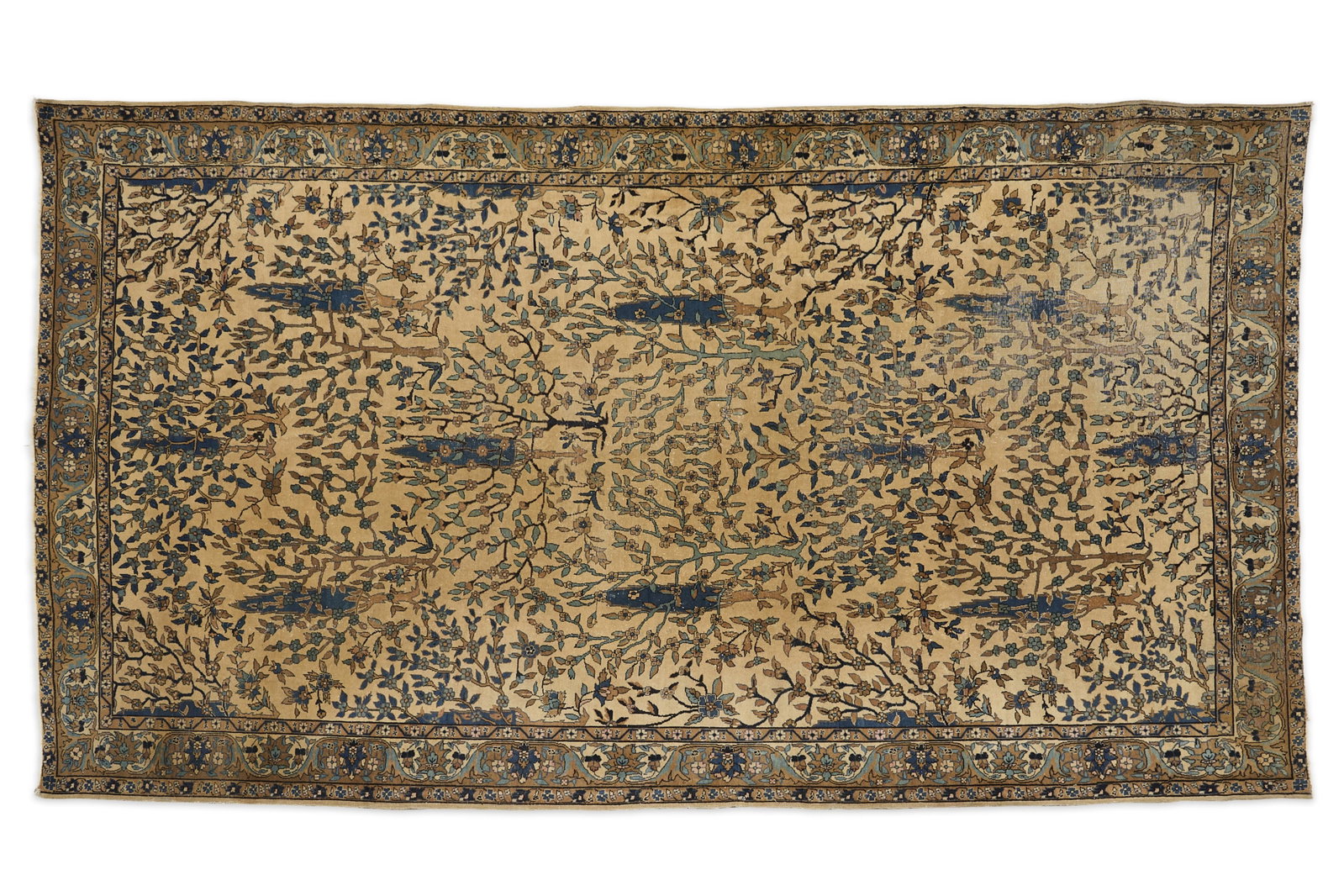 Large Persian Qom Tree Rug 11'7" x 6'6": Large Persian hand-woven wool rug, possibly Qum or Qom. With a central field of beige and profuse symmetrical arboreal, foliate, and floral designs in deep blues and browns. Bordered with large and sm